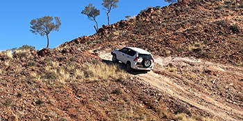 4 wheel drive traversing rocky terraine